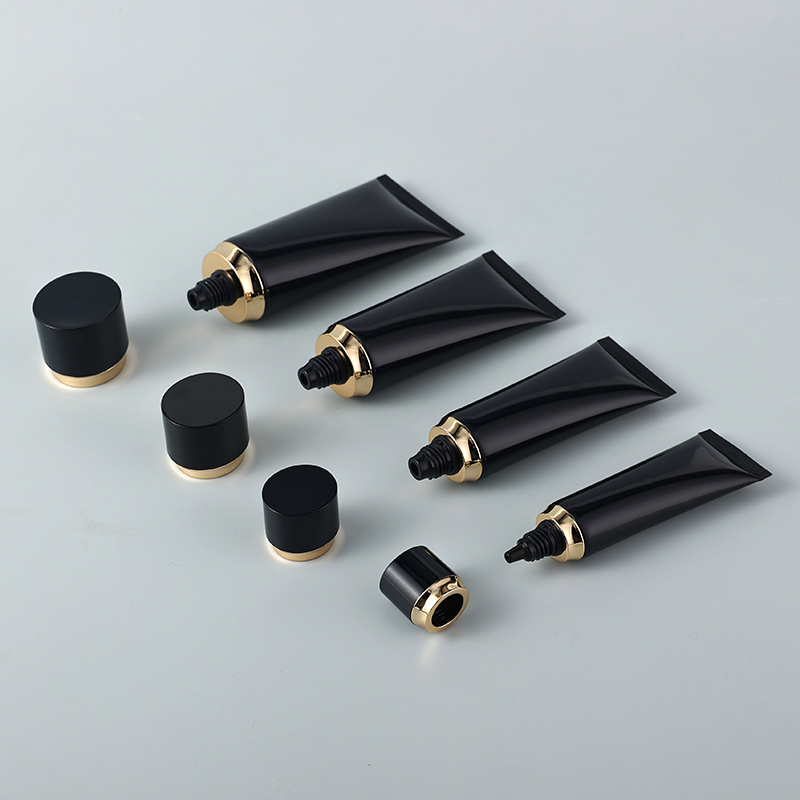 Luxury OEM black golden shoulder round cosmetic squeeze tube hand cream shampoo packaging