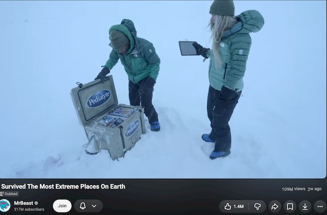 65QT rotomolded cooler interior storing food and beverages in snowy conditions