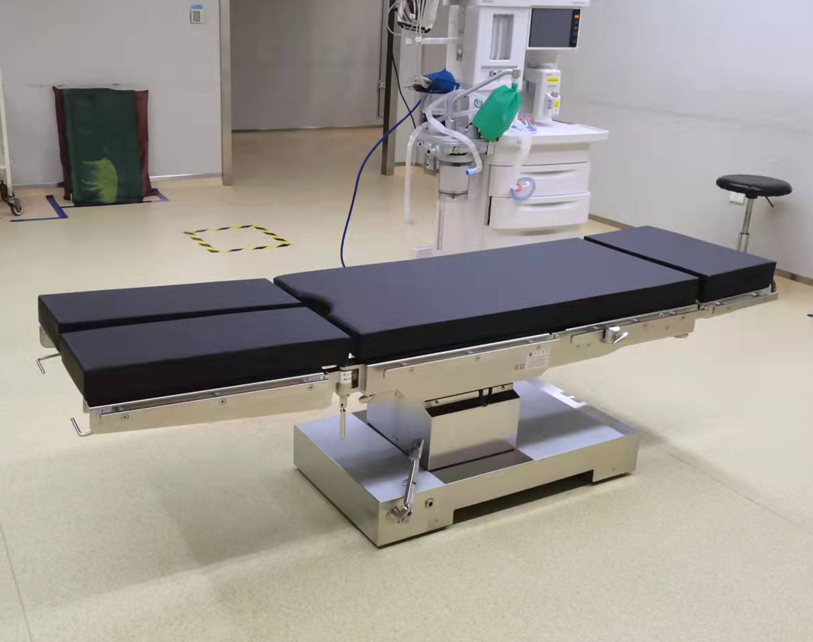 Is there an orthopedic operating table available in the market that incorporates sliding and X-ray features?