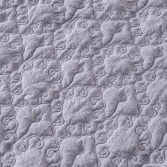 Elegant Embroidered Quilt with Ruffle Edge