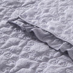 Elegant Embroidered Quilt with Ruffle Edge