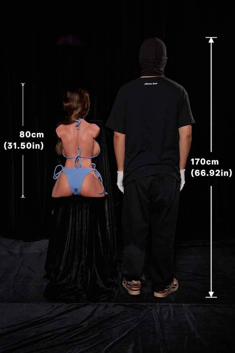 ULW 663# Emma: This full rear-view comparison photo with marked dimensions displays the 80cm (31.50in) doll in a blue bikini next to a 170cm (66.92in) person, providing a direct scale comparison from behind against a dark backdrop.