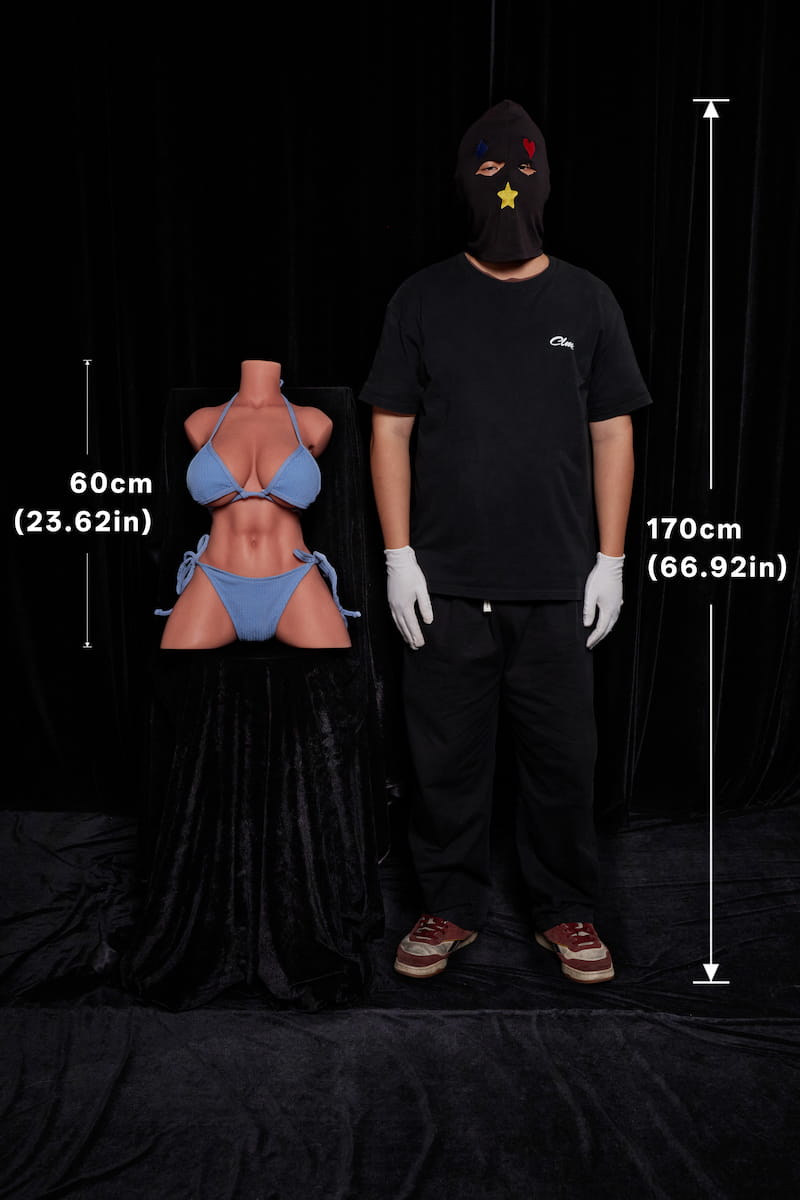 ULW 663# Emma: This front-view comparison image displays a 170cm tall man standing next to a 60cm torso doll wearing a light blue bikini against a black backdrop, intuitively showcasing her realistic skin texture, prominent bust profile, and well-toned abdominal lines.