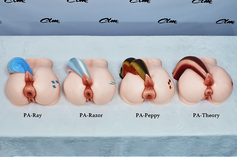 This top-down collection group shot displays the four flat-laid products side-by-side, providing a direct contrast of their plump hip contours, distinct private anatomies, and vibrant tail colors.