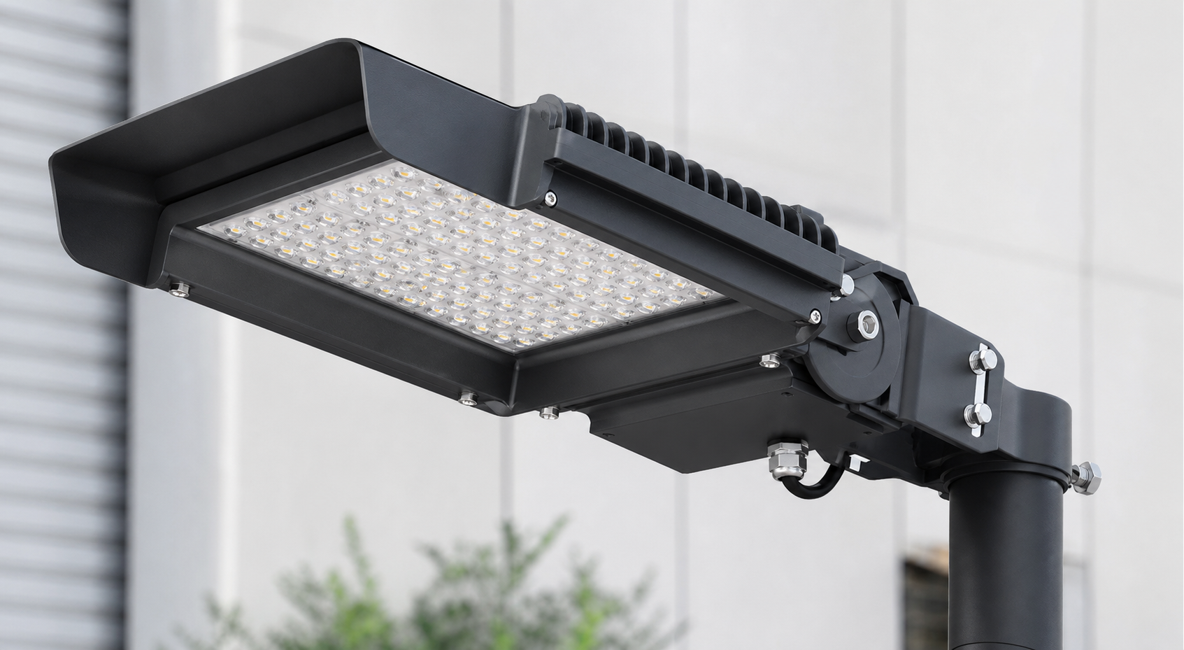 IP65 outdoor LED area light fixture with sealed housing heat sink and adjustable bracket