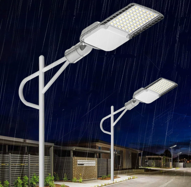 STL-002 LED street lights installed along a residential road in rainy night conditions
