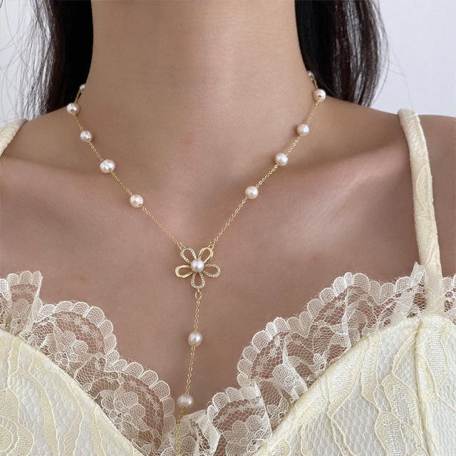 Hollow flower water pearl lariet necklace