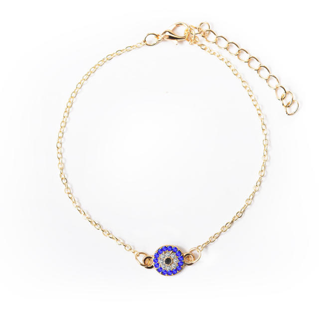 Diamond-encrusted evil's eye chain anklet