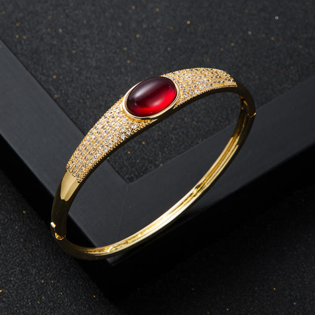 Gold plated oval agate diamond bangle
