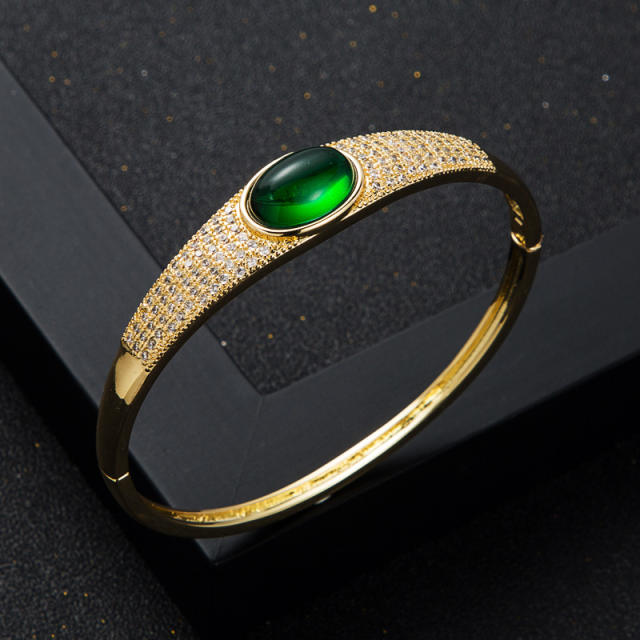 Gold plated oval agate diamond bangle