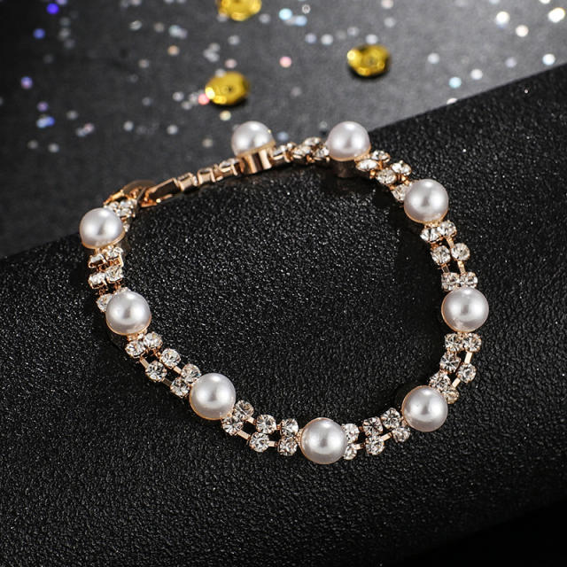 Rhinestone pearl tennis bracelet