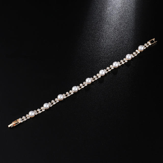 Rhinestone pearl tennis bracelet