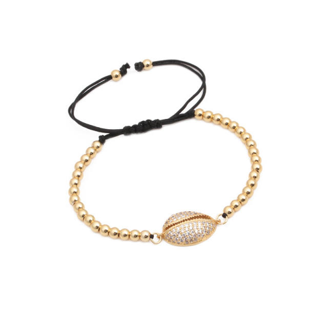 Shell charm gold bead bracelet