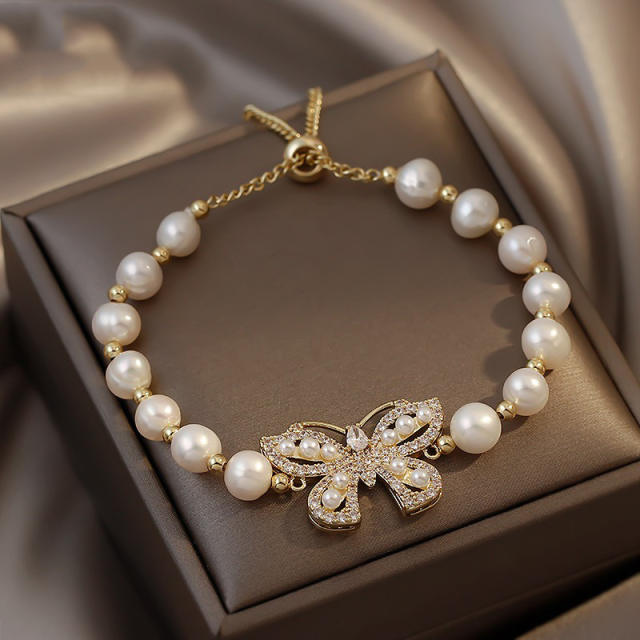 Butterfly charm natural pearl bracelet