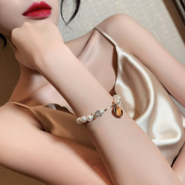 Wafer charm natural pearl bracelet