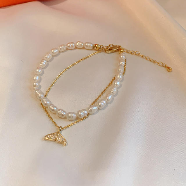 Butterfly charm pearl bracelet
