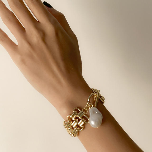 Baroque pearl charm toggle chain bracelet