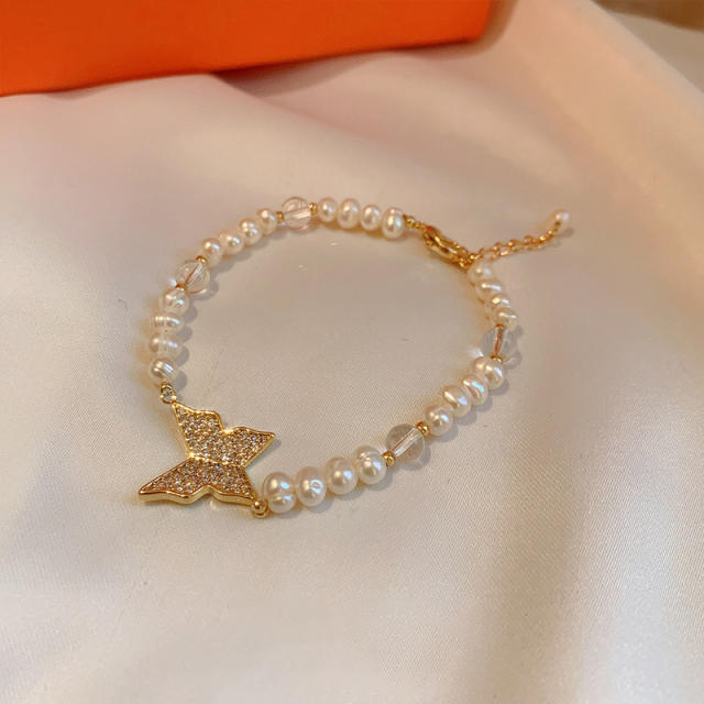 Butterfly charm pearl bracelet