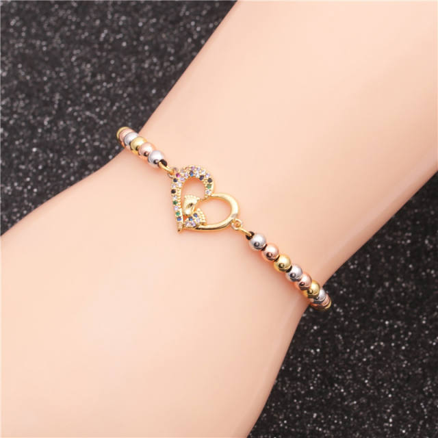 Cubic zirconia LOVE heart gold bead bracelet