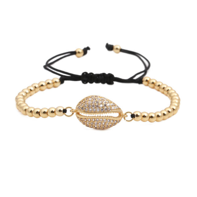 Shell charm gold bead bracelet