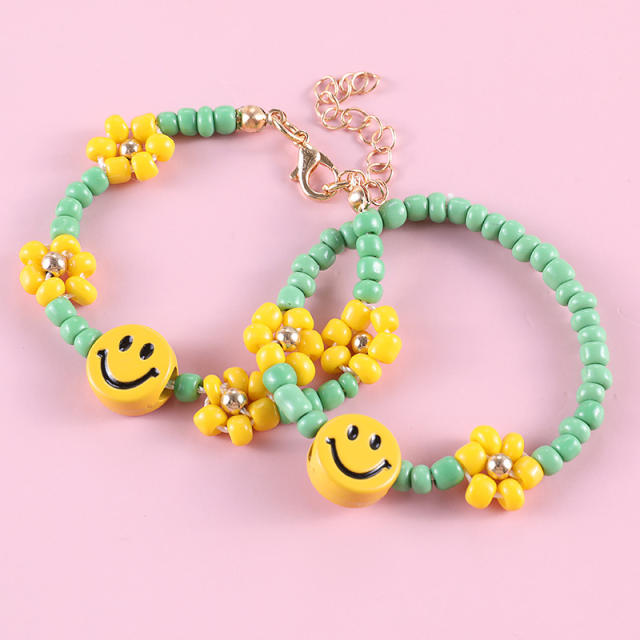 Green color seed beads smile face bracelet
