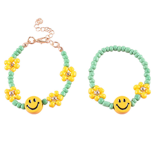 Green color seed beads smile face bracelet
