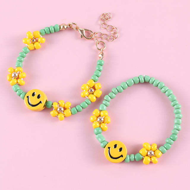 Green color seed beads smile face bracelet