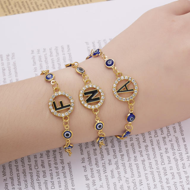 Diamond inital letter evil eye bracelet