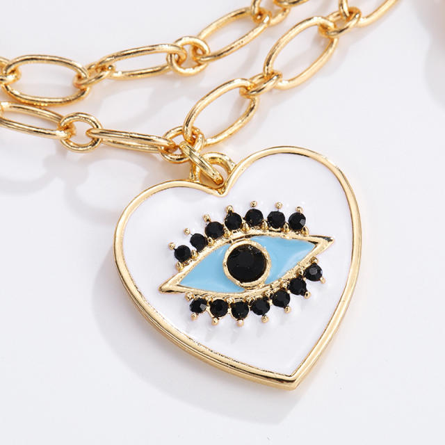 Enamel heart charm evil eye chain bracelet
