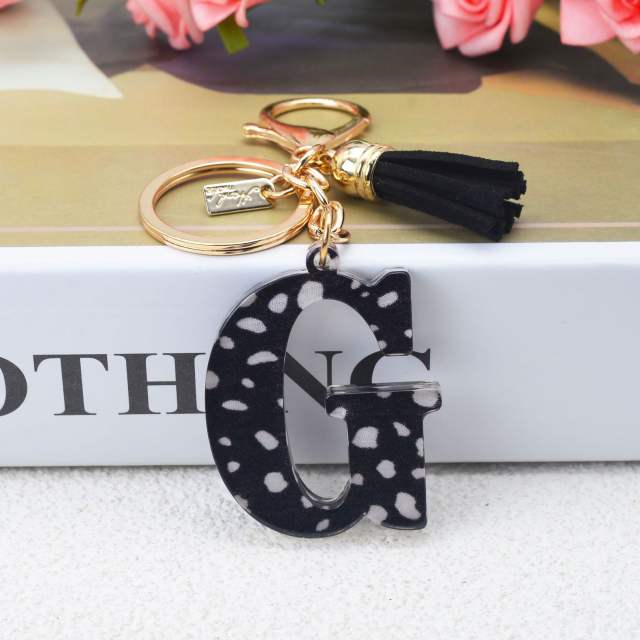 Black tassel white dots keychain