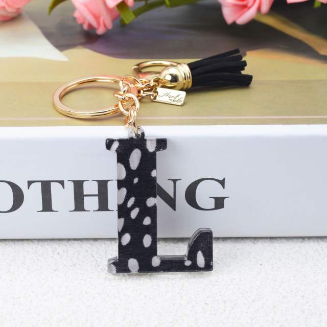 Black tassel white dots keychain