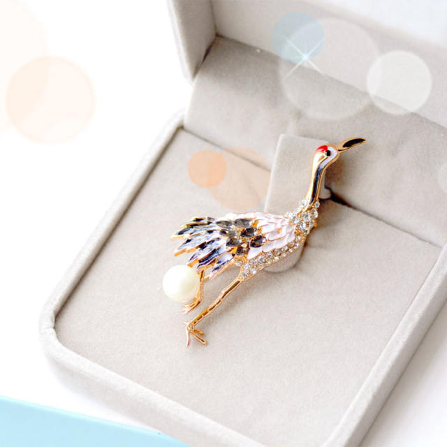 Printed peacock pearl diamond brooch