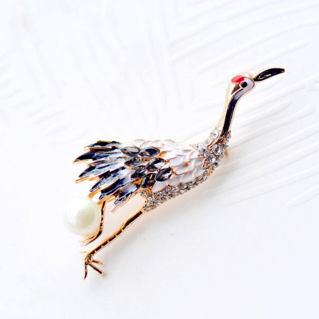 Printed peacock pearl diamond brooch