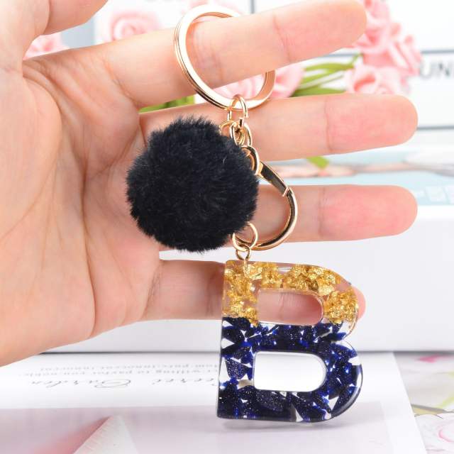 Black shell  hairball inital letter keychain