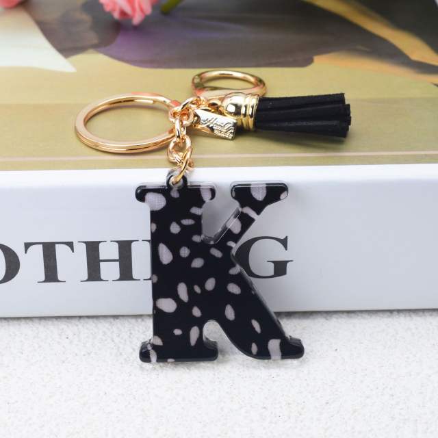 Black tassel white dots keychain