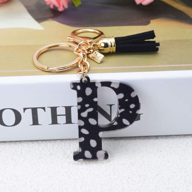 Black tassel white dots keychain