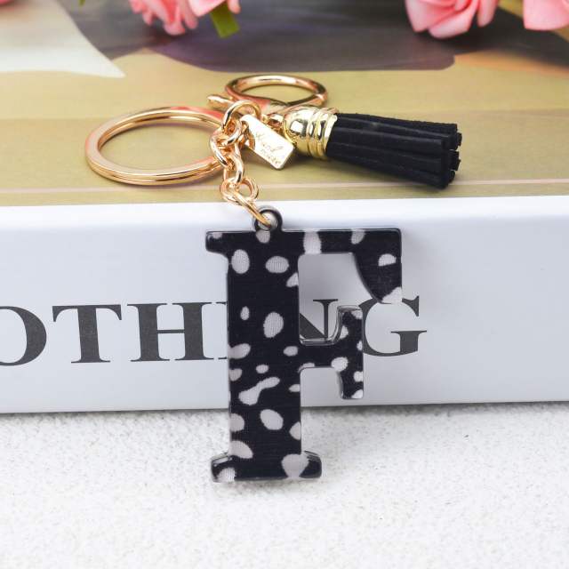 Black tassel white dots keychain