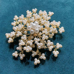 Elegant faux pearl beaded snowflake brooch