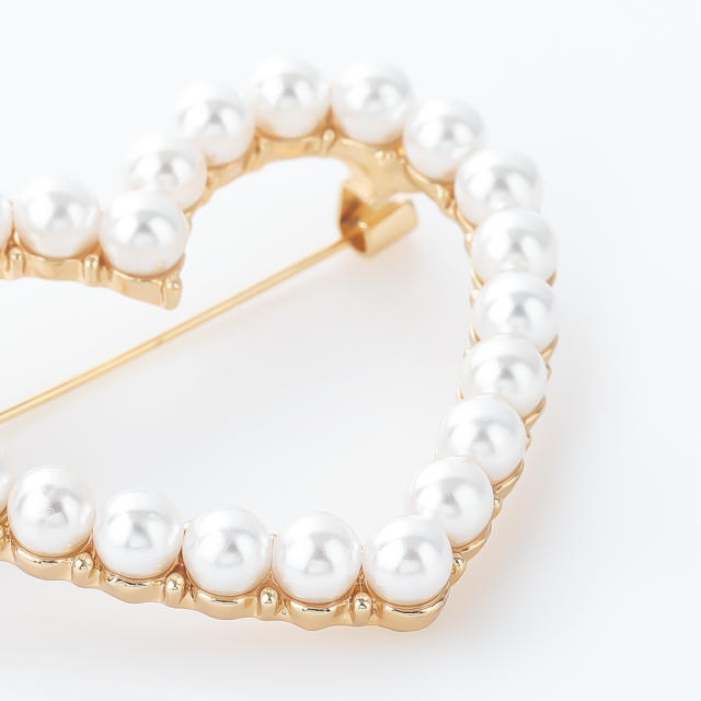 Faux pearl heart brooch