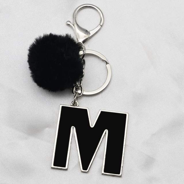 Black hairball metal keychain
