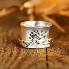 Dandelion engraved spinner rings