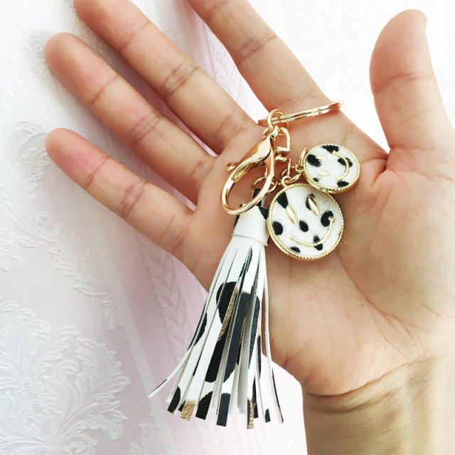 PU leather leopard smiley face tassel keychain