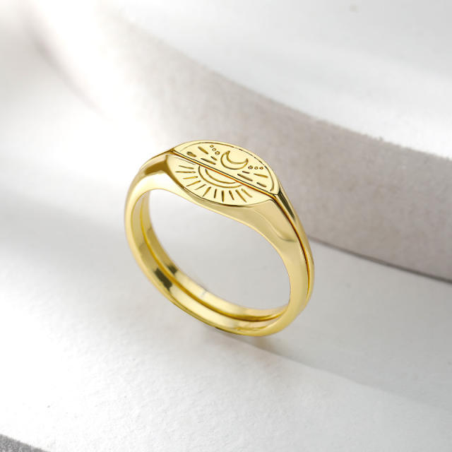 Engraved moon and sun matching rings