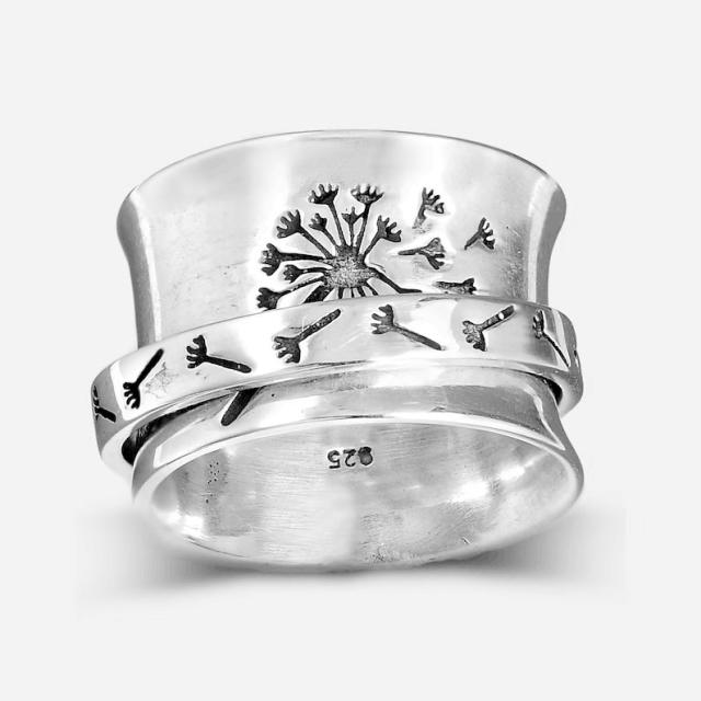 Dandelion engraved spinner rings