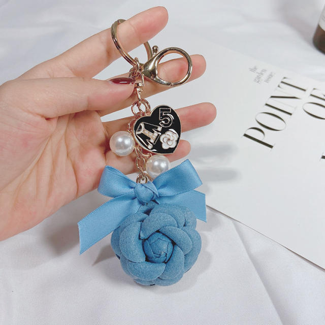 Pearl camellia double-sided keychain