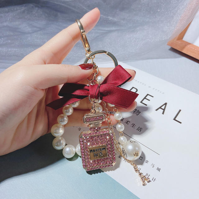 Diamond battle pearl bow-knot keychain