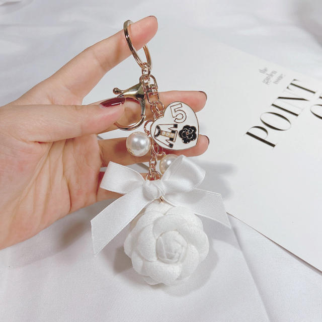 Pearl camellia double-sided keychain