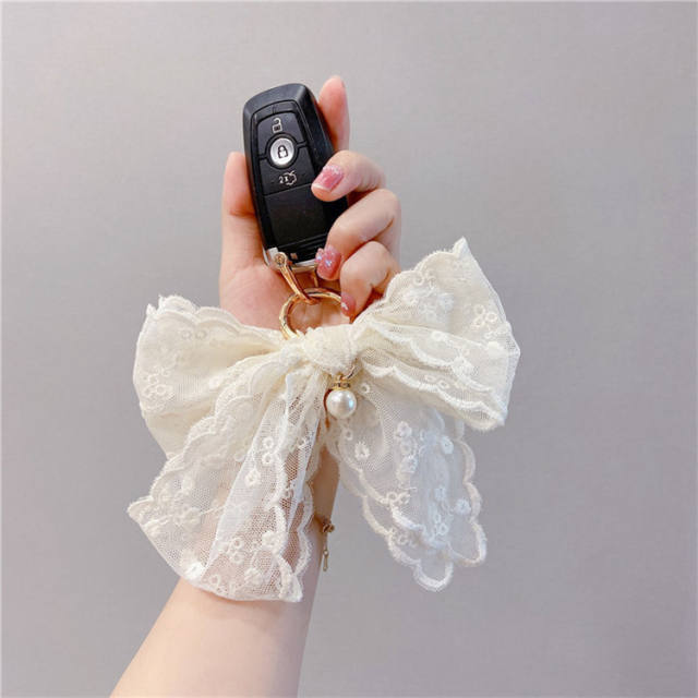 Lace bow pearl keychain