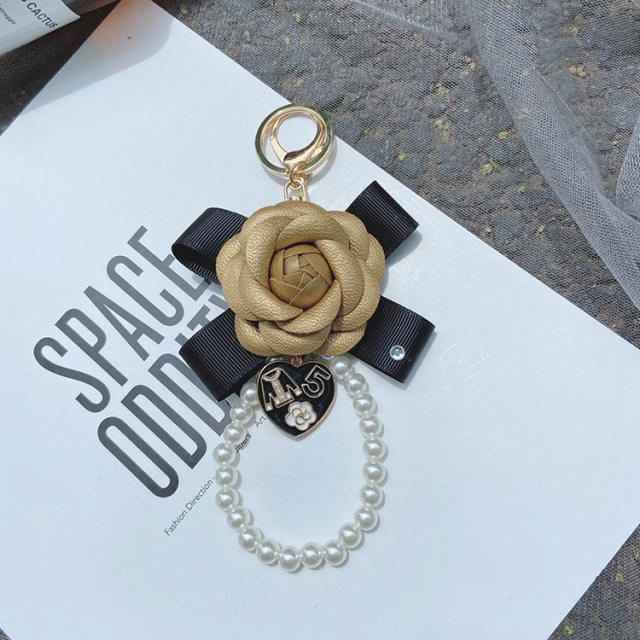 Bow-knot flower pearl keychain