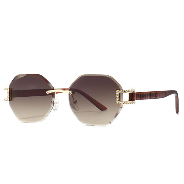 Irregular shaped rimless sunglasses